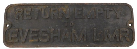 A cast iron railway sign, bearing the wording 'Return Empty to Evesham LMR', 51cm wide.