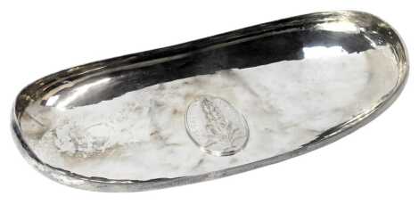 An Elizabeth II silver presentation bowl, of oval form, with hammered design and central Galton Institute floral banner, presented to Professor DF Roberts Galton Lecturer 20th September 1990, London 1978, 21.71oz, 27cm wide.