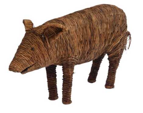 A contemporary wicker figure modelled as a pig, 46cm high, 85cm long.