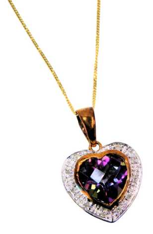 A heart shaped pendant and chain, the heart shaped pendant set with alexandrite surrounded by cz stones, in white and yellow gold, on a fine link 9ct gold neck chain, the pendant 2.5cm high, the chain 44cm long, 2.1g all in, boxed.