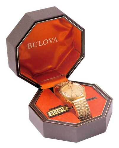 A Bulova automatic gent's wristwatch, stainless steel back on expanding gold plated strap and face, with twenty-three jewel movement, the face 3cm diameter, boxed.