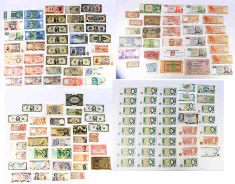 A selection of World and UK banknotes, comprising United States of America one hundred dollar bills stamped counterfeit, Japanese rupees, Malawi Kwachas, Disney Land dollars, British one pound notes, etc. (a quantity)