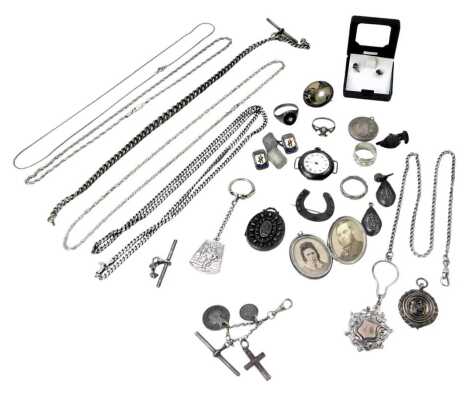 Various silver and other costume jewellery, comprising floral lockets, butterfly wing brooches, watch chains, shield fob crests, horseshoe brooches, dress rings, enamel cufflinks, etc., 226.2g all in.