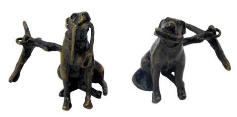 A pair of loaded bronzed cufflinks, each depicting a dog holding a bone, with bronzed effect finish.