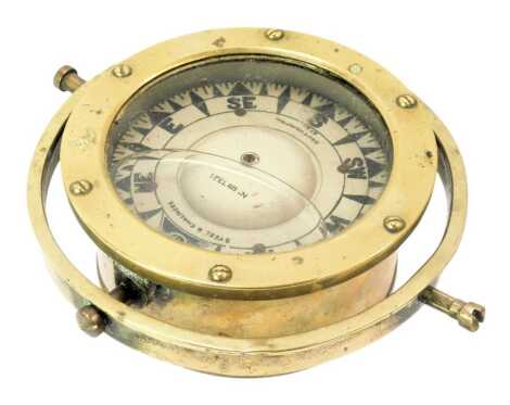 A Steel and Chalmers gimbal compass, Southampton, numbered BB7321, 17cm diameter.