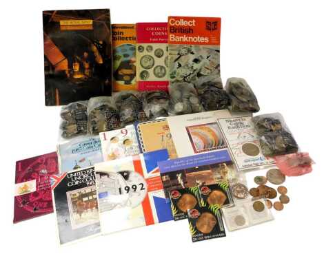 A collection of pre decimal coinage, comprising half pennies, coin packs, hammered tokens, five pence pieces, various coin packs, to include The Uncirculated Coin Collection 1983, 1992, Ladybird book of Coin Collecting, various other banknote and coin rel