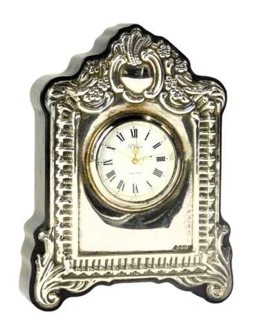 An Elizabeth II Robert Carr silver mounted and mahogany cased mantel clock, the white enamel Roman numeric dial with gold hands, maker Robert Carr, Sheffield 1994, 11cm high.