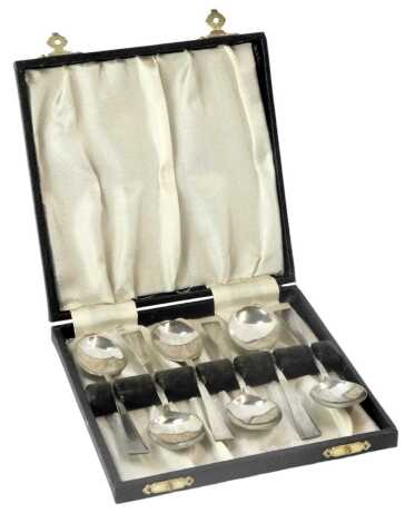 A cased set of six George VI silver teaspoons, each in the Art Deco style with shaped triangular top, Birmingham 1937, 1.96oz, in fitted case.