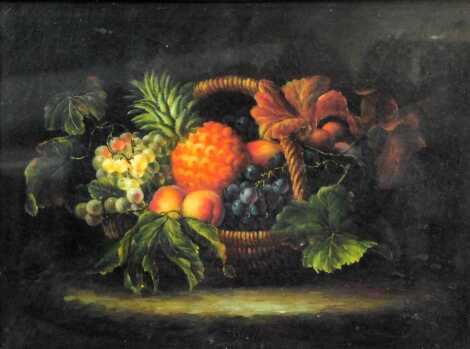 Still life print, depicting fruit in a basket, contained in an ornate painted wooden frame, the frame 60cm x 67cm.