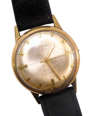 A Rotary Incabloc gold cased gent's wristwatch, with silvered batoned dial, and seventeen jewel movement, the dial 3.5cm diameter, on a black leather strap, boxed. (AF)