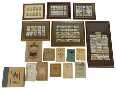 Cigarette cards, in albums and framed, to include Gallagher Wild Flowers, John Player RAF Badges, etc. (1 shelf)