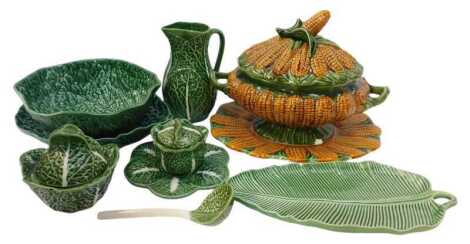 A group of cabbage leaf pottery, to include a jug, 24cm high, fruit bowl, 29cm wide, etc., together with a corn cob two handled dish and cover and serving plate, the tureen 30cm high, (AF).