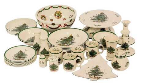 A group of Spode Christmas Tree pattern dinner wares, to include a cake plate, salt and pepper shakers, Christmas tree shaped dish, various dinner plates, candlesticks, together with a Portmeirion Christmas related bowl, 28cm diameter, etc. (3 trays)