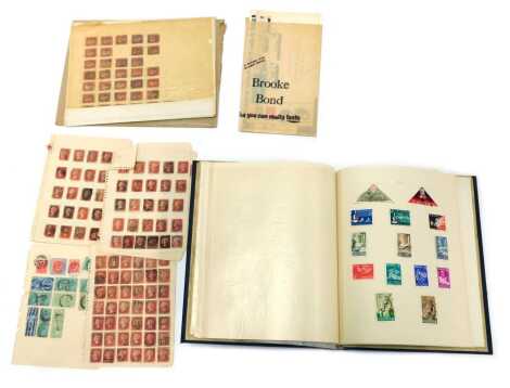 Philately. An album containing World and UK stamps, Victorian period to 1980s, to include a penny black and penny blue, together with various sheets of penny reds, each postally used and perforated.