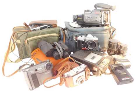 Cameras and equipment, to include Praktica LTL3 camera in case, a Kodak Retinette camera, Ajax 10x50 cased binoculars, various lenses, etc. (a quantity)