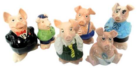 Six Wade Natwest piggy banks, each with stopper.