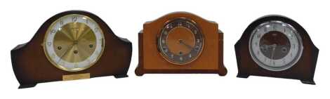 Three oak cased mantel clocks, comprising Bentima, with Arabic numerals, eight day movement with Westminster chime, with presentation plaque, Smiths Enfield, Arabic numerals, eight day movement, and a Bentima eight day clock with Westminster chimes, Arabi