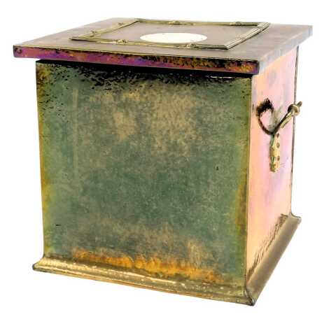 A late 19th/early 20thC two handled brass coal box, of square form, with raised lion and cross decoration to the hinged top, enclosing a galvanised metal liner, on an out swept base, 34cm high, 35cm wide, 37cm deep.