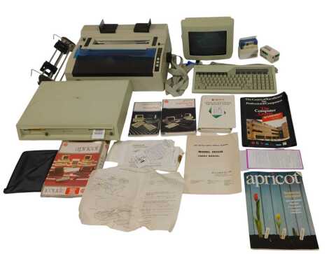 An Apricot home computer system, comprising high resolution 9" monitor, in mono-white, serial No. 9HM 015912, a monitor, a keyboard, various manuals, printer, etc., boxed. (a quantity)