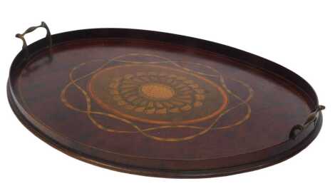 A Georgian mahogany and marquetry two-handled tray, of oval form, decorated centrally with an oval and Prince of Wales feathers, within ribbon surround, with satinwood and ebony inlay, 59cm wide.