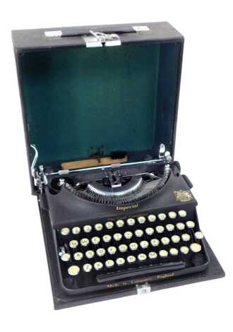 An Imperial 'The Good Companion' portable typewriter, in case.