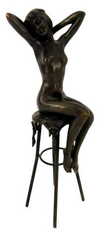 After Demetre Haralamb Chiparus. A bronze figure, modelled as a nude female seated on a stool, with foundry mark for J B Deposee, Paris, 26cm high.