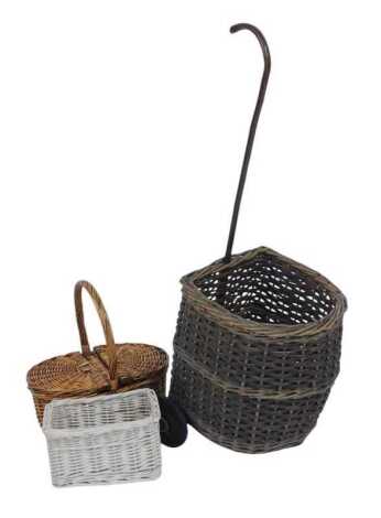 A wicker shopping trolley, with stick handle, on wheels, together with a wicker flower basket, etc.