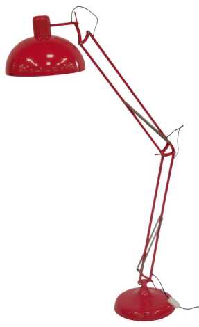 An Anglepoise type floor standing lamp, in red, approx 185cm high.