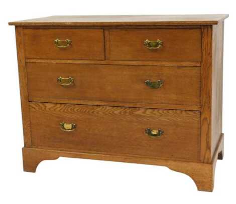 An early 20thC oak chest, of two short above two long drawers, on bracket feet, 82cm high, 107cm wide, 50cm deep.