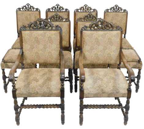 A set of ten 20thC oak dining chairs, with scroll and leaf carved overstuffed back, overstuffed seat, on spindle turned legs with spindle turned supports, (8+2). (AF)