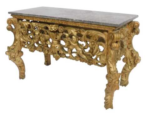 A 19thC Continental console table, with grey marble top on an ornate giltwood carved base decorated with cherubs, flowers, scrolling motifs, etc., 68cm high, 107cm wide, 47cm deep.