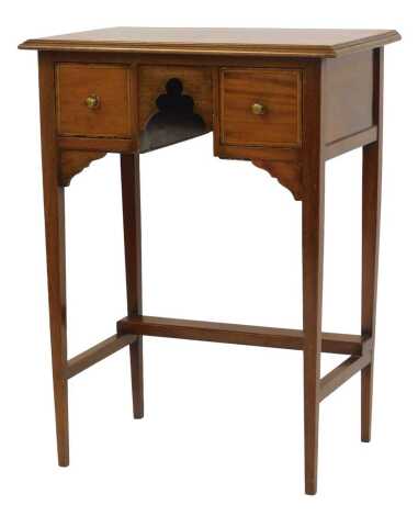 A 19thC mahogany side table, the rectangular top with a moulded edge above carved frieze flanked by two line inlaid drawers, on square tapering legs with stretchers, 77cm high, 57cm wide, 36cm deep.