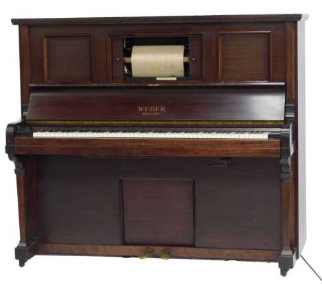 A Weber Duo-Art mahogany upright pianola, 156cm wide, together with various pianola rolls. Ivory exemption license obtained. Upon initial inspection the motor runs and plays. The case has some fading but no damage evident. We are awaiting the ivory licens