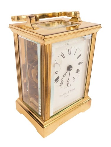 A 20thC brass cased carriage clock, the rectangular white enamel dial bearing Roman numerals for Mappin and Webb London, drum barrel movement, with glass sides, back and top, bearing presentation inscription for AT Kirk In Recognition of 38 Years Service