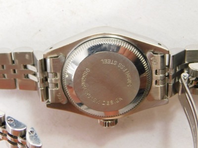 A ladies Rolex Oyster Perpetual Datejust wristwatch, model number 69174, circa 1988, with stainless steel case, and bracelet strap, having diamond markers to the silvered dial, with original green leather case and some paperwork. - 4