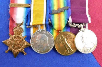 A WWI Royal Artillery medal group, comprising 1914 star, with 'Mons' clasp, 1914/18 British War Medal, Victory Medal, with oak leaf insignia (mentioned in dispatches) George V Long Service and Good Conduct Medal, inscribed to 6077 Bombardier E Seabrook, R - 2