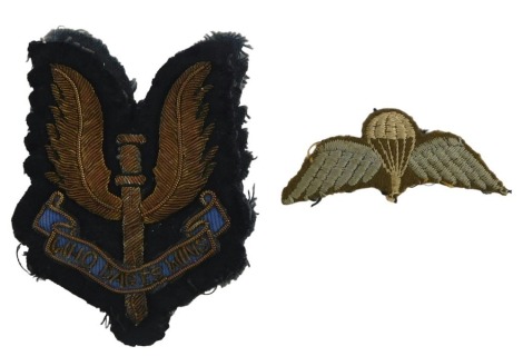 An SAS gold braid and cloth blazer badge, and a parachute wings cloth badge, (2).