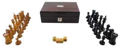 A Staunton boxwood chess set, complete, but one white pawn with a loss to the top, contained in a Victorian rosewood work box with inlaid mother of pearl, and four additional poker dice.