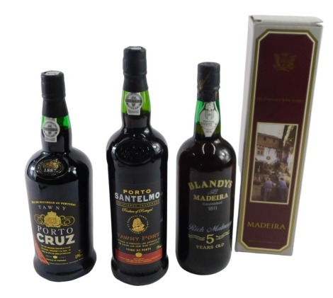 Two bottles of port, and a bottle of Blandy's Madeira sherry, the port being Santelmo tawny port, 75cl, and Porto Cruz tawny port, 75cl. (3)