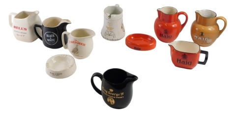 A group of Scotch whisky advertising water jugs, and ashtrays, including Haig, Bell's, Glenfiddich, Black & White, etc. (10)