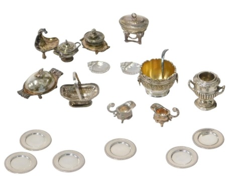 A collection of Royal Tunbridge Wells Ltd silver doll's house miniatures, comprising a selection of classic antique style dining table silver, including a Regency wine cooler, fluted cake basket, Monteith punch bowl and ladle, sweetmeal dish, scalloped bu