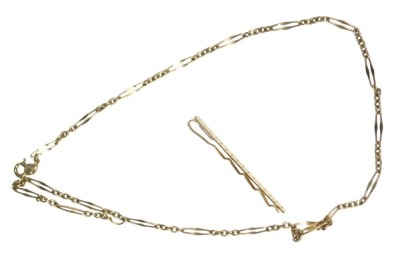 A 9ct gold thin chain necklace, hallmarked, 44cm long, 5.5g, and a 9ct gold tie pin, total weight 7.6g. (2)