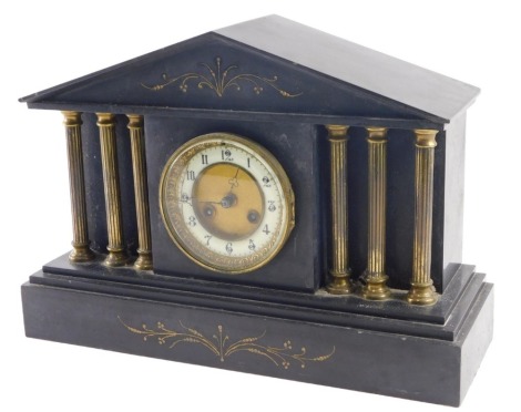 A late Victorian slate cased architectural mantel clock, the case with classical Portico design, with brass architectural columns, and gilt highlights, with eight day movement and white enamel chapter ring, with Arabic numerals, 38cm high, 40.5cm wide.