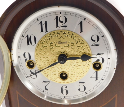 A Hermle mantel clock, with eight day striking and chiming movement, with Arabic numerals, and mahogany and burr walnut inlaid case, 25.5cm high, with two keys. - 2