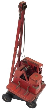 A vintage Tri-ang tinplate Jones KL44 toy crane.