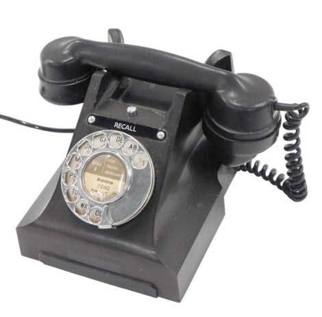 A GPO E2 330L black Bakelite telephone.