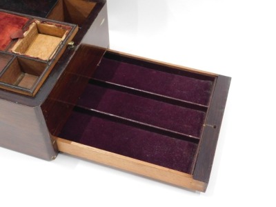 A Victorian rosewood work box, with hinged lid in mother of pearl plaque, and mother of pearl key escutcheon, the interior fitted with numerous divisions, pin cushion, and with secret drawer, 15cm high, 27cm wide, 20cm deep. - 2