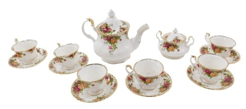 A Royal Albert Country Roses pattern service, comprising teapot, six cups and six saucers, and sugar basin with cover.