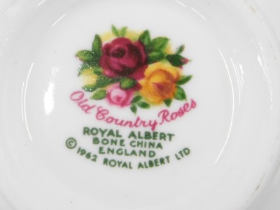 A Royal Albert Country Roses pattern service, comprising teapot, six cups and six saucers, and sugar basin with cover. - 2