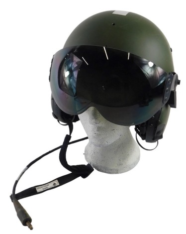 A Military aviators helmet, 22c, mark 4A/4, size medium, with headphones, and visor.